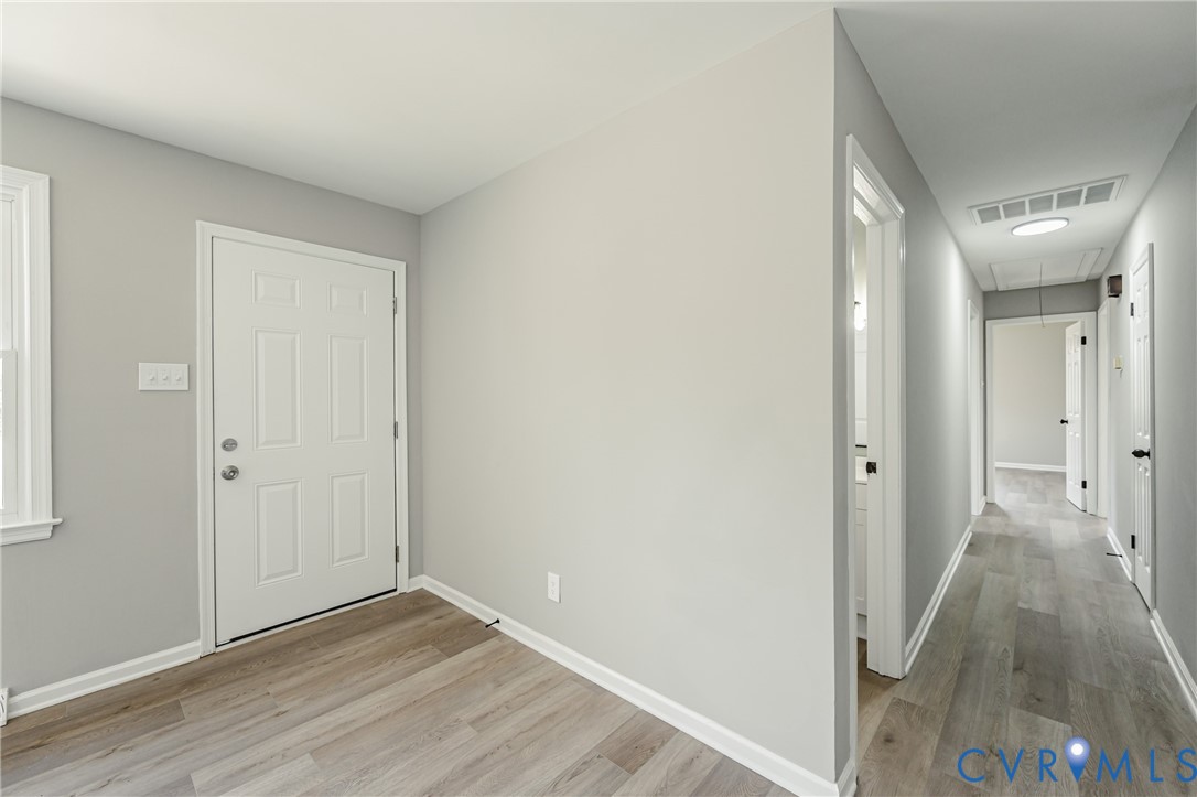 15412 Exter Mill Road Chesterfield, VA 23838 - Photo 23 of 60 Entryway with light wood-style flooring and basebo