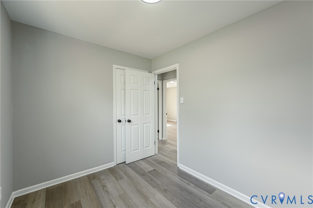 15412 Exter Mill Road Chesterfield, VA 23838 - Photo 41 of 60 Unfurnished bedroom featuring light wood-style flo
