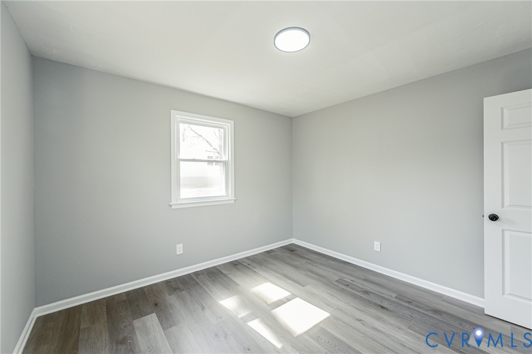 15412 Exter Mill Road Chesterfield, VA 23838 - Photo 45 of 60 Unfurnished room featuring baseboards and light wo