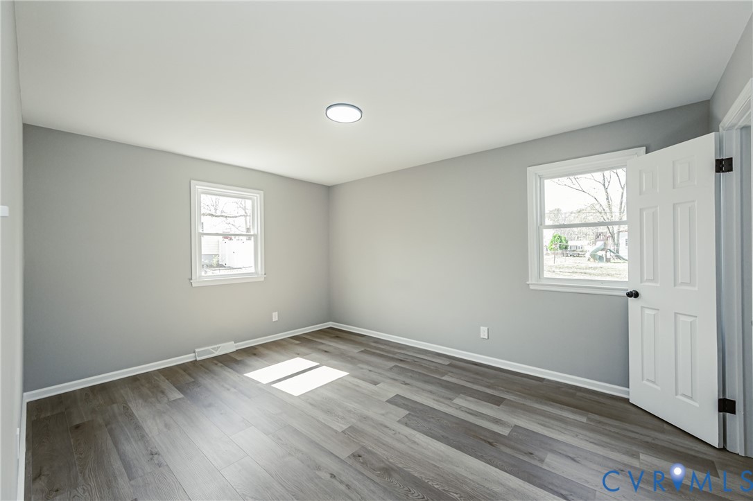 15412 Exter Mill Road Chesterfield, VA 23838 - Photo 46 of 60 Spare room with baseboards and light wood-style fl