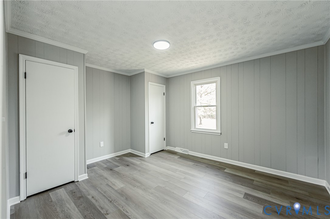 15412 Exter Mill Road Chesterfield, VA 23838 - Photo 53 of 60 Unfurnished bedroom featuring light wood-style flo