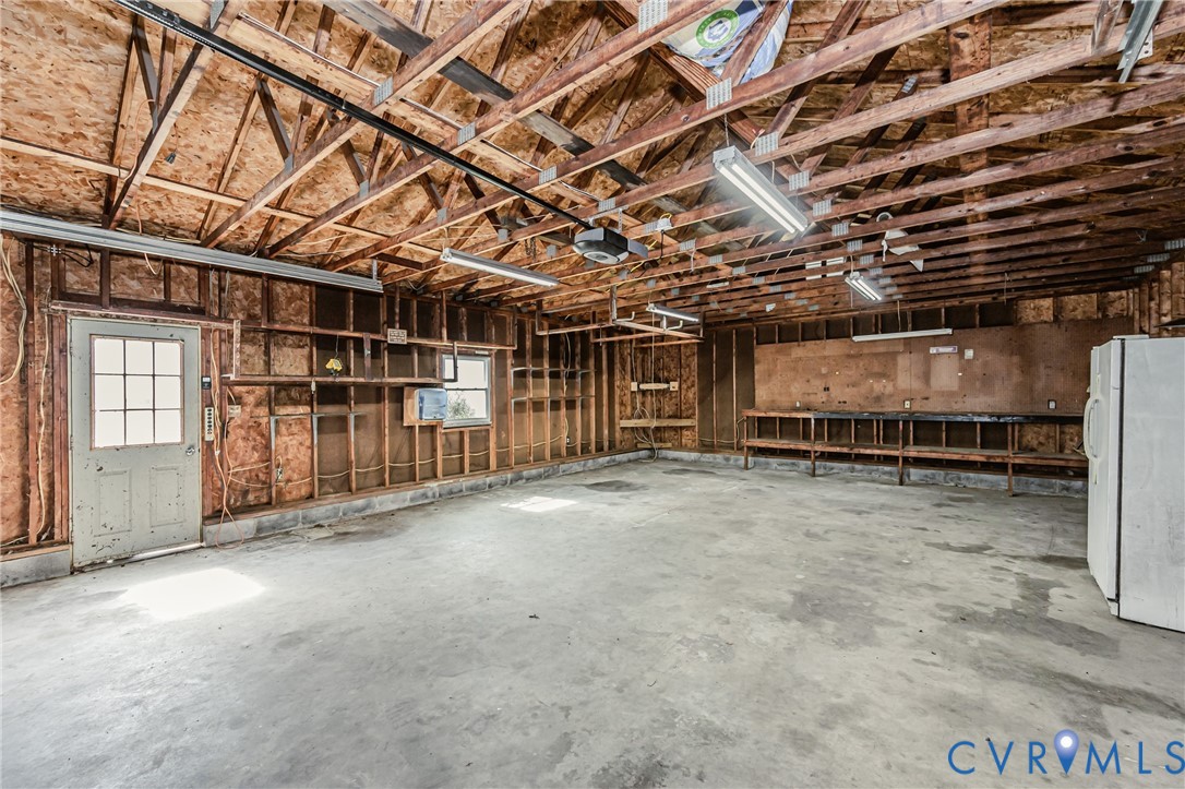 15412 Exter Mill Road Chesterfield, VA 23838 - Photo 59 of 60 Garage with freestanding refrigerator and a garage