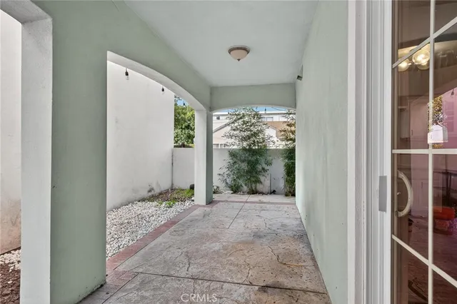 a view of a big room with a rug