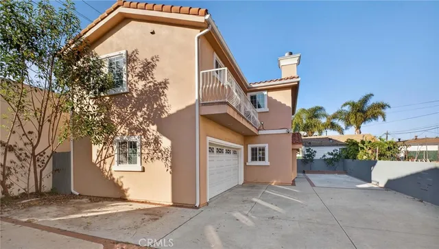 a front view of a house with a garage