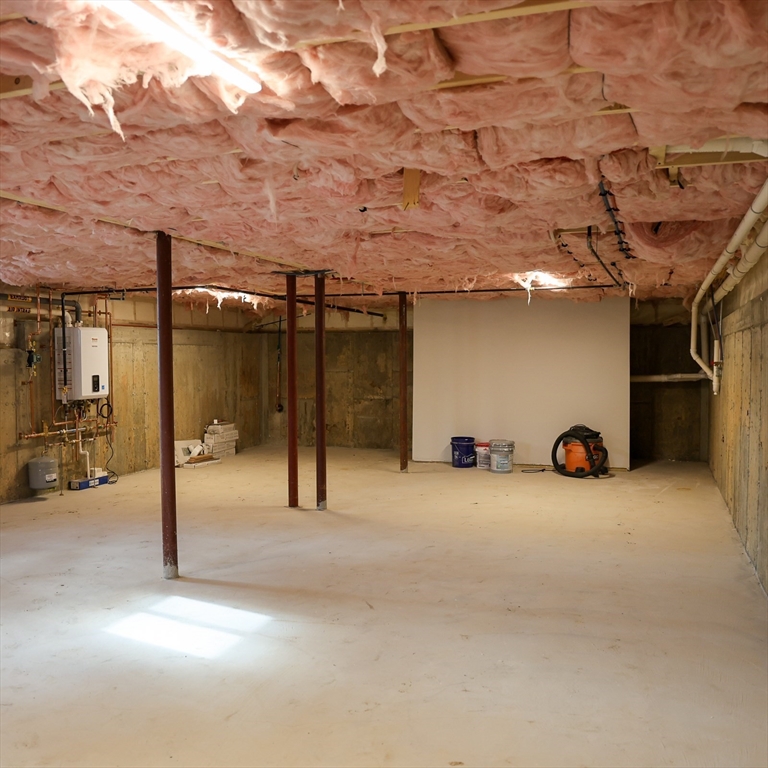 598 School Street, Unit REAR ADU Lowell, MA 01851 - Photo 42 of 42 a view of a garage