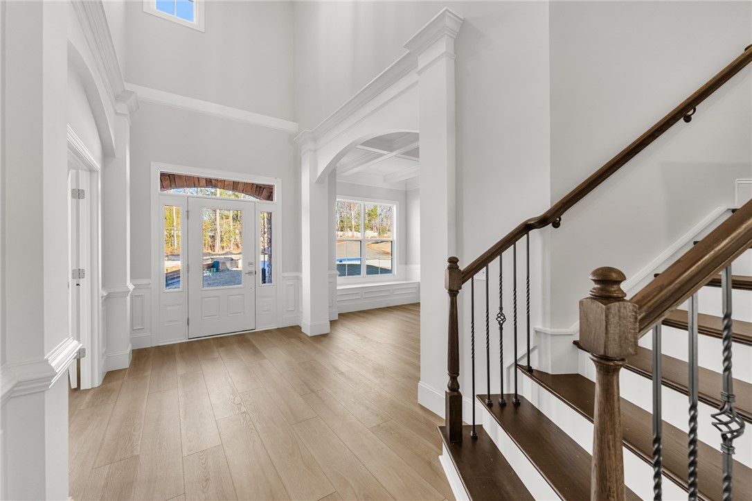 141 Rickys Path Easley, SC 29642 - Photo 2 of 40 Enter into a welcoming space with warm wood floors and abundant natural light.