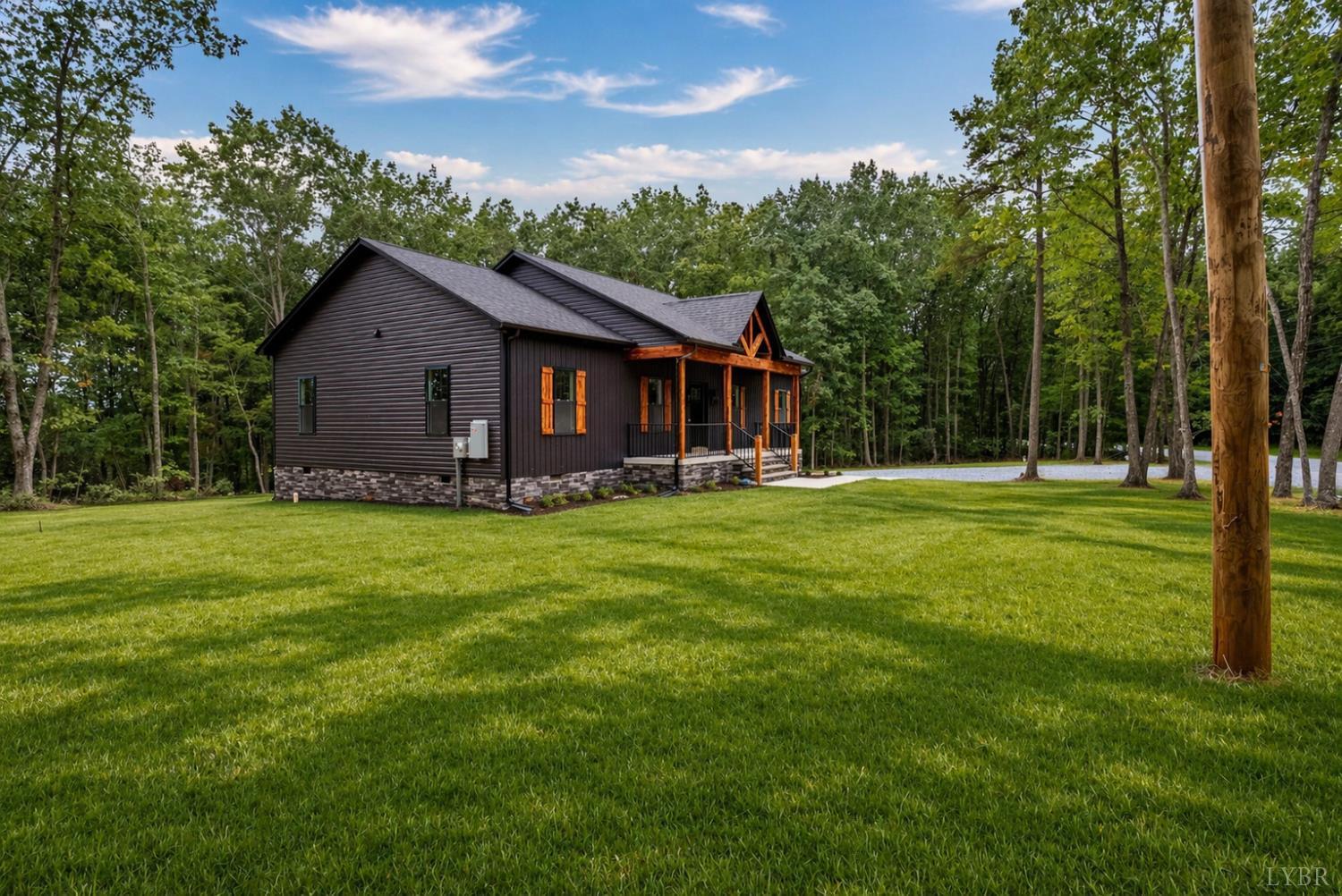594 Community Road Dillwyn, VA 23936 - Photo 2 of 49 a front view of house with yard and green space