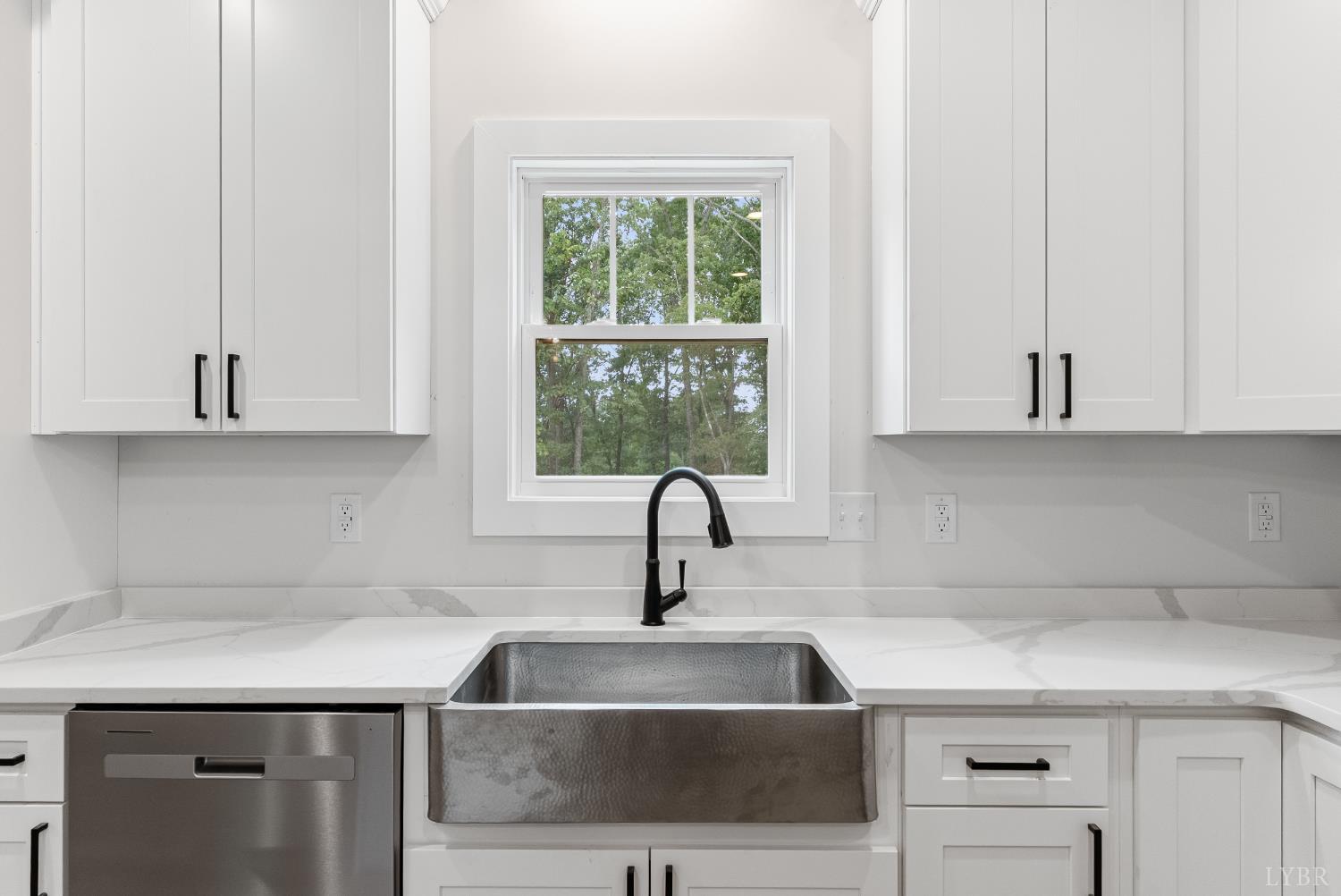 594 Community Road Dillwyn, VA 23936 - Photo 23 of 49 a kitchen with a sink and cabinets