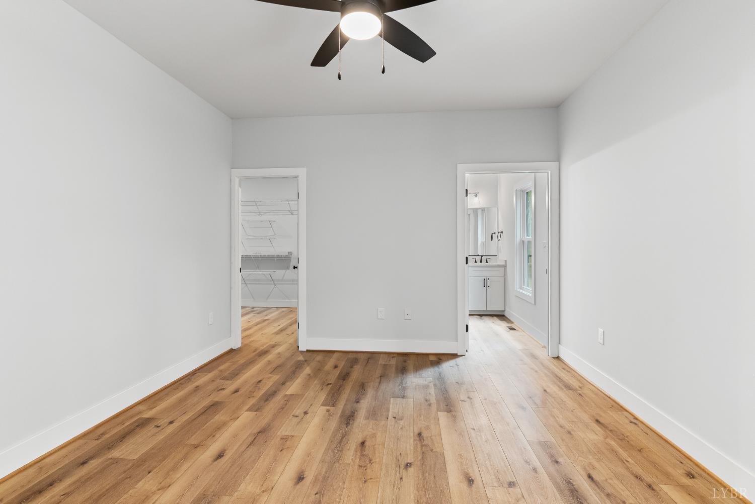 594 Community Road Dillwyn, VA 23936 - Photo 32 of 49 wooden floor in an empty room with a window