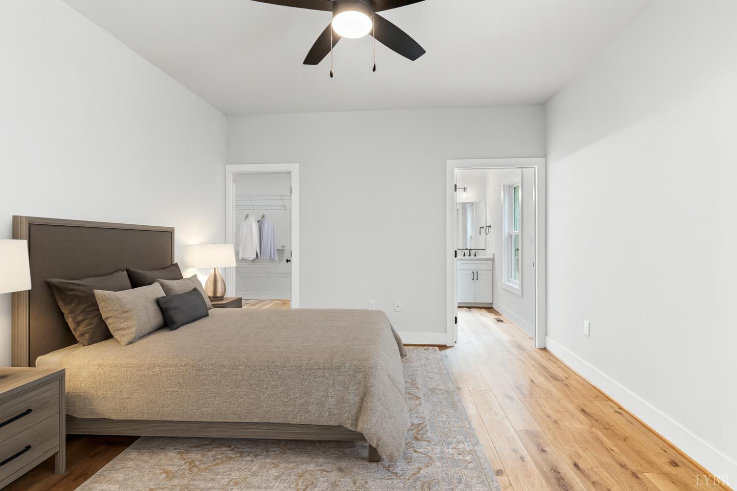 594 Community Road Dillwyn, VA 23936 - Photo 10 of 49 a bedroom with a bed and painting on the wall