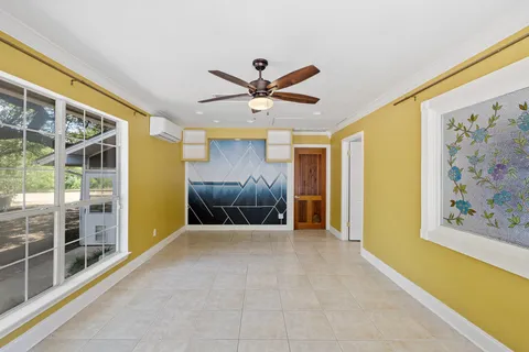 a view of a livingroom with a flat screen tv