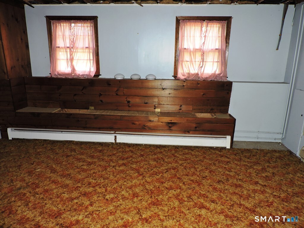 269 Griffin Road South Windsor, CT 06074 - Photo 26 of 36 a view of wooden floor and cabinet in a room