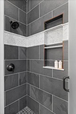 a room with walk in closet and window