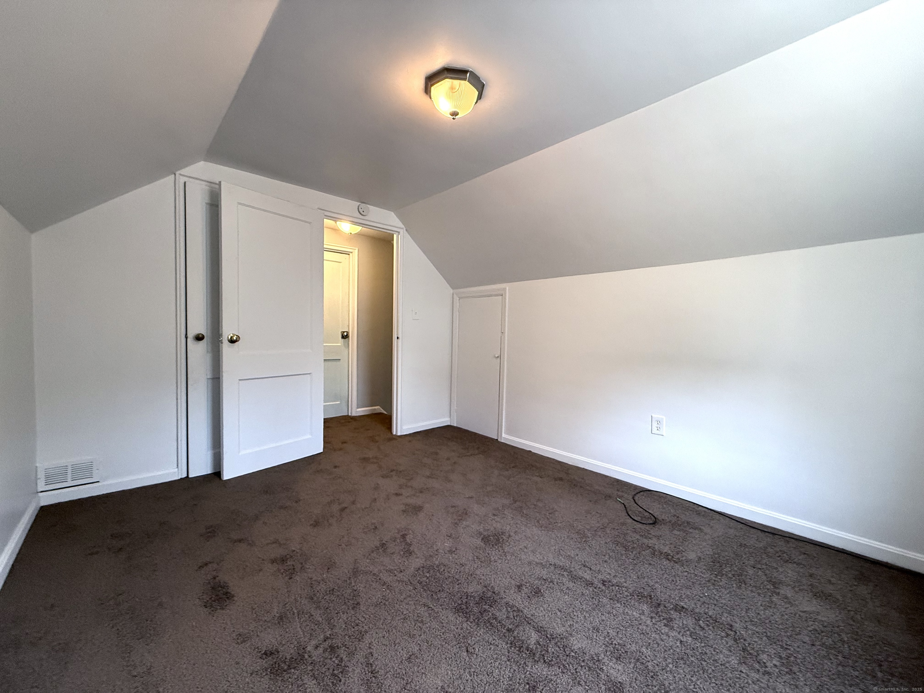 211 Spencer Street Naugatuck, CT 06770 - Photo 18 of 25 a view of an empty room