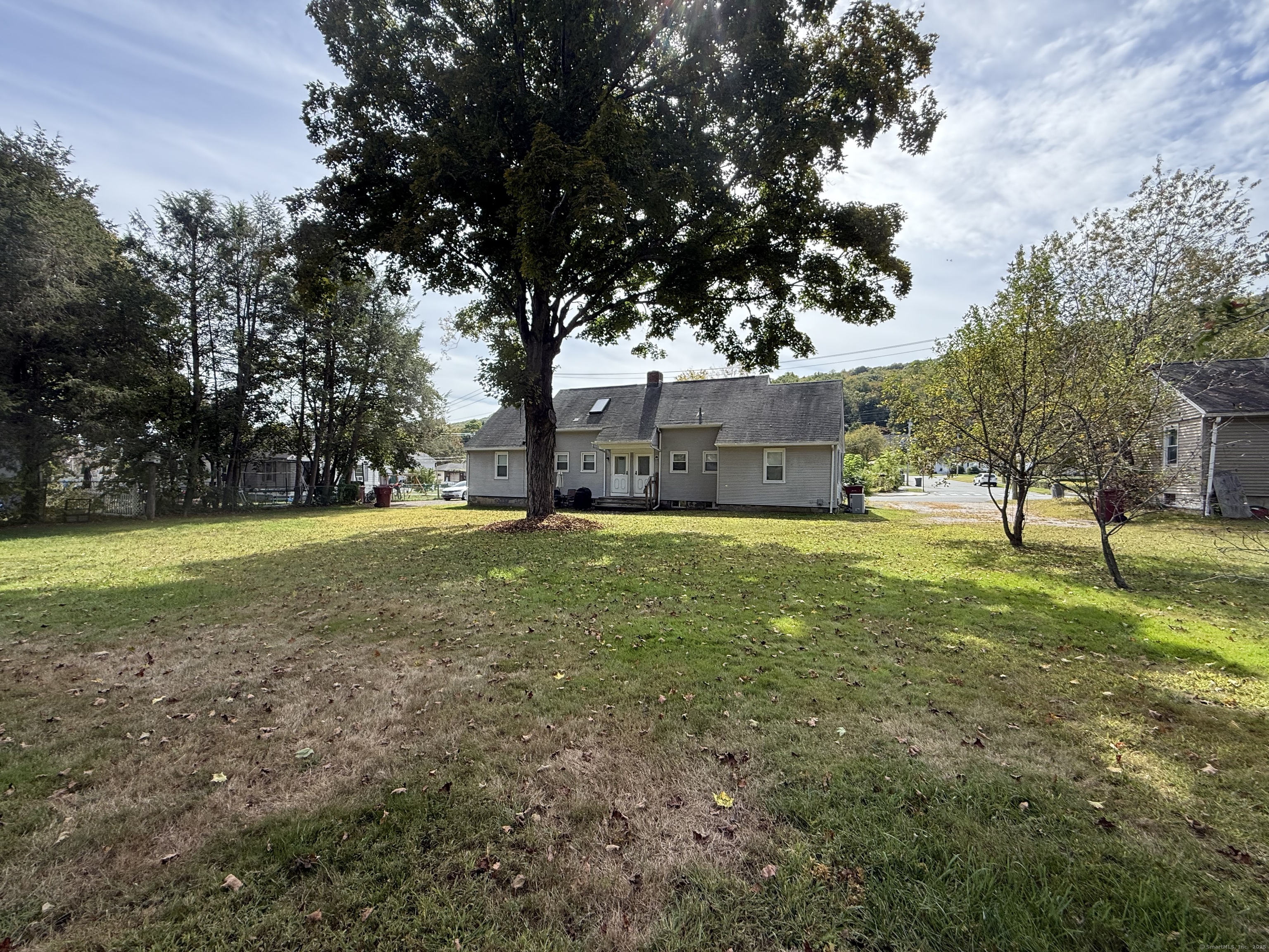 211 Spencer Street Naugatuck, CT 06770 - Photo 22 of 25 a view of a house with a yard