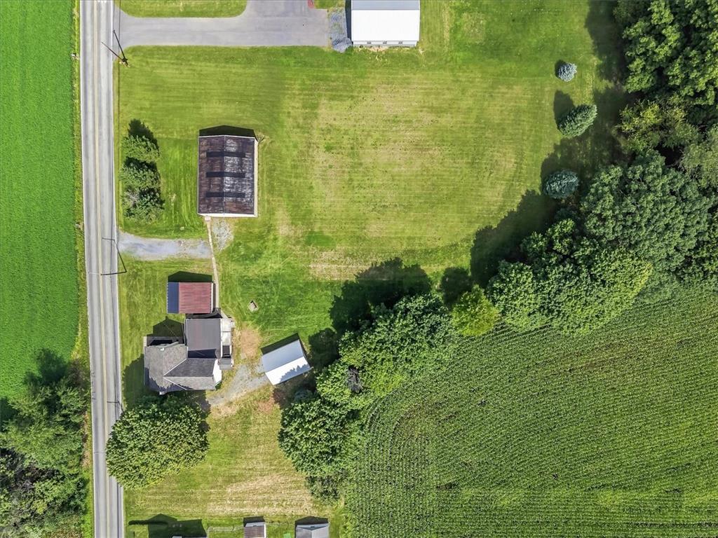 2412 Clearview Road Coplay, PA 18037 - Photo 48 of 53 An aerial perspective reveals extensive acreage surrounded by mature trees and open fields.