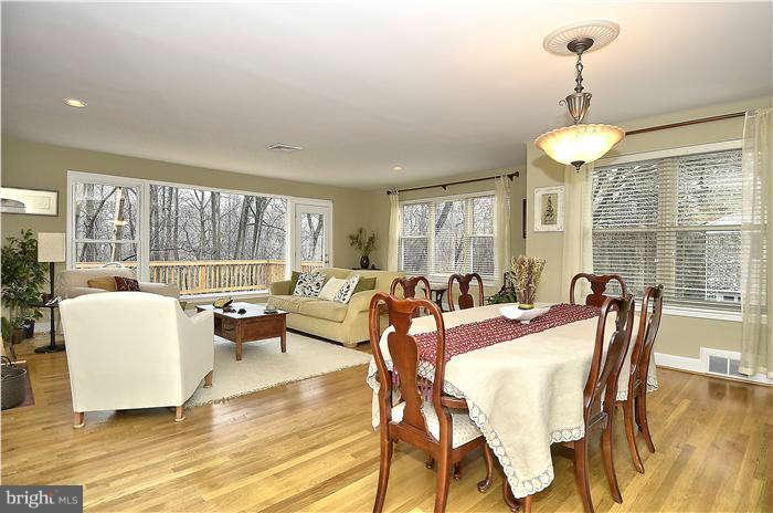 9314 Harvey Road Silver Spring, MD 20910 - Photo 5 of 7 a view of a dining room with furniture window and outside view