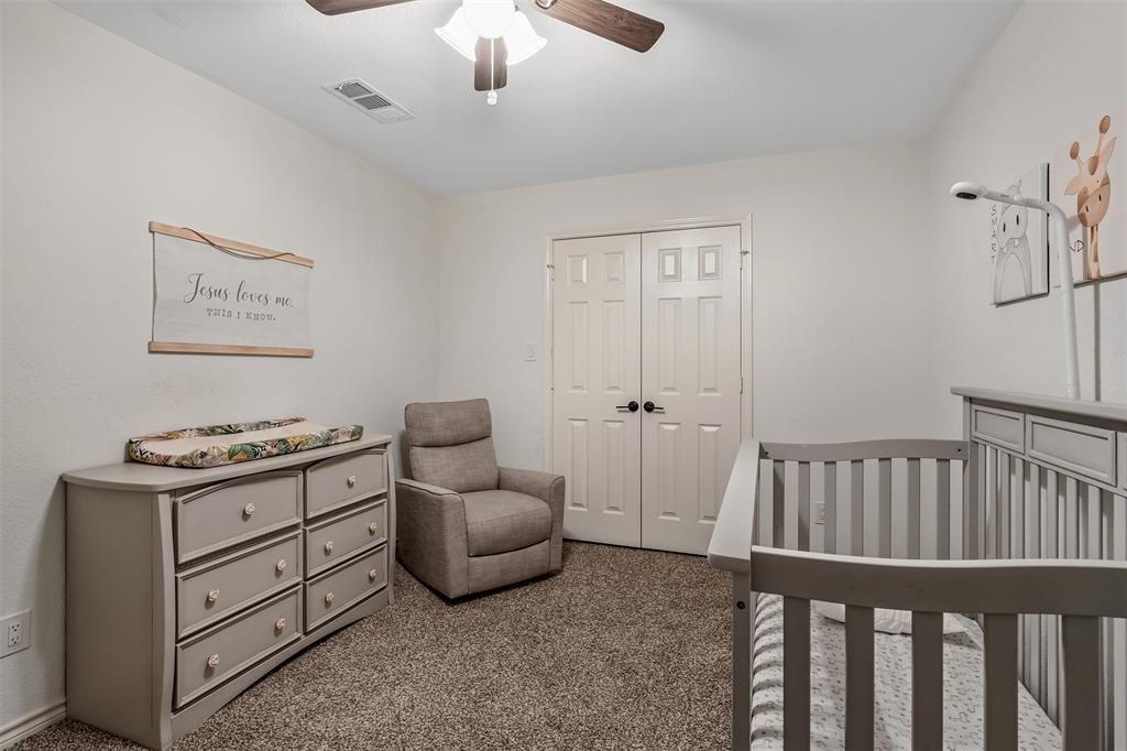 300 Rash Lane Terrell, TX 75160 - Photo 22 of 28 a livingroom with furniture and ceiling fan