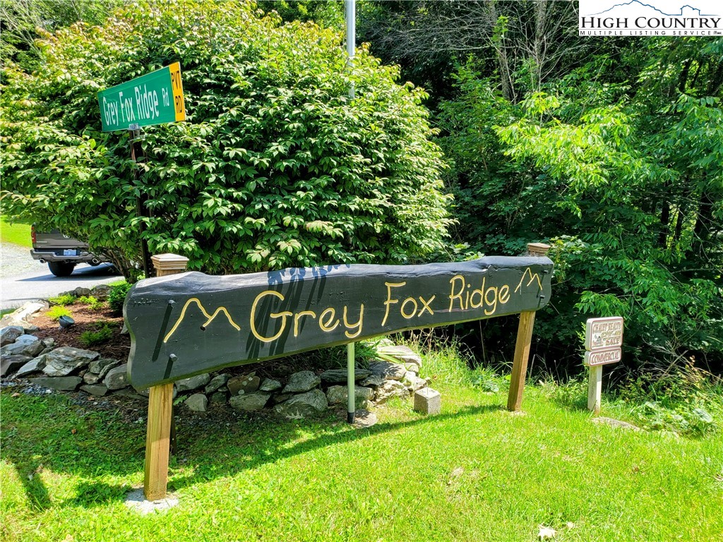 515 Grey Fox Ridge Road Banner Elk, NC 28604 - Photo 18 of 25 a view of a table and chairs in a yard