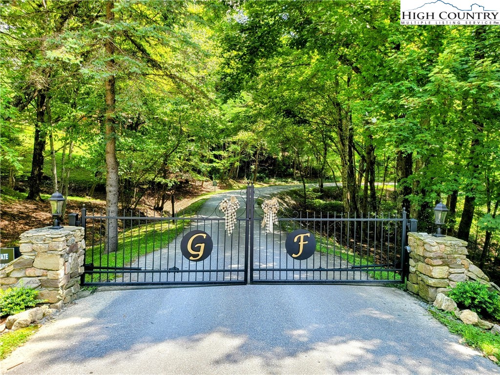 515 Grey Fox Ridge Road Banner Elk, NC 28604 - Photo 5 of 25 a view of street along with trees