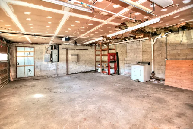 a view of a garage with wooden floor