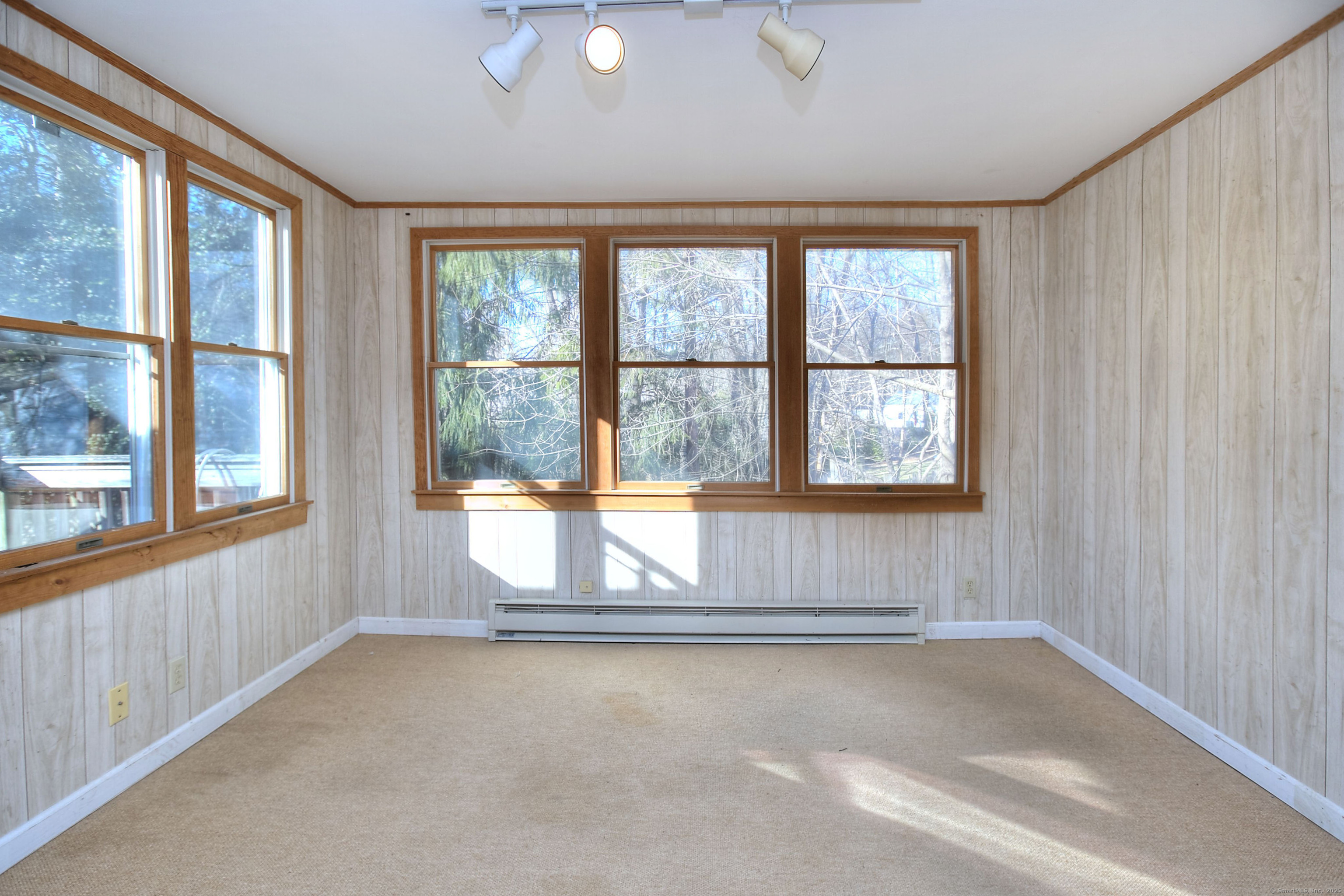 489 Main Street Westport, CT 06880 - Photo 8 of 40 an empty room with large windows