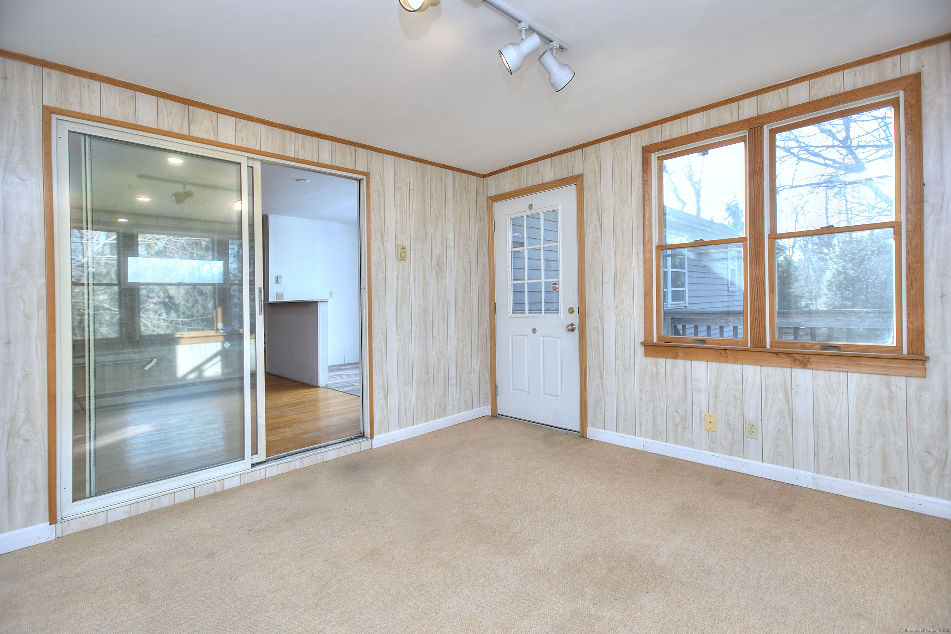489 Main Street Westport, CT 06880 - Photo 9 of 40 an empty room that has a view of windows