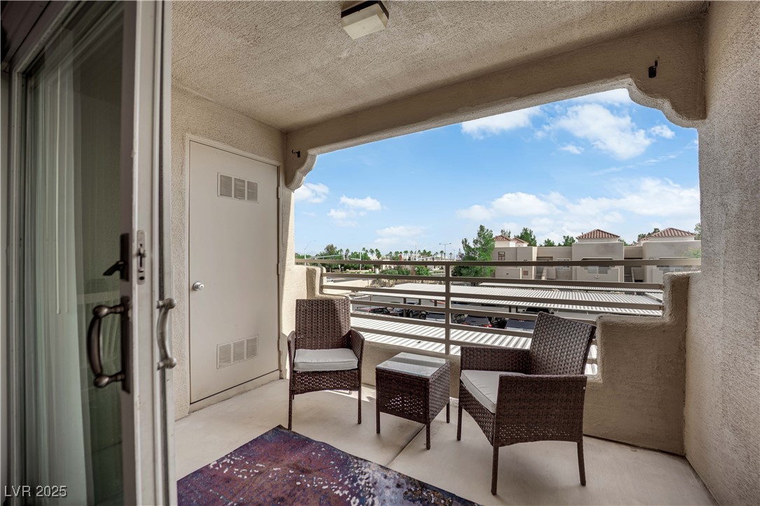 1909 Mountain Hills Court, Unit 205 Las Vegas, NV 89128 - Photo 33 of 34 View of balcony