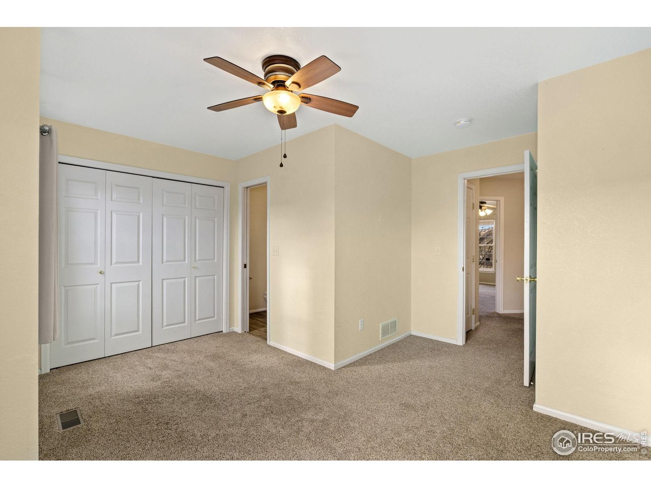 6612 Avondale Road, Unit 2B Fort Collins, CO 80525 - Photo 12 of 20 Second bedroom on upper level