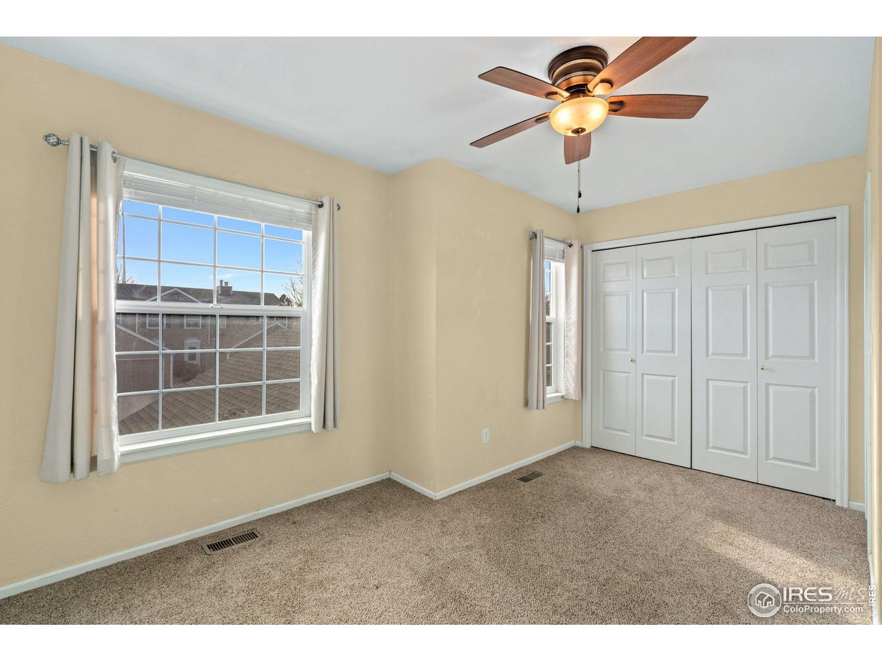 6612 Avondale Road, Unit 2B Fort Collins, CO 80525 - Photo 13 of 20 Second bedroom on upper level