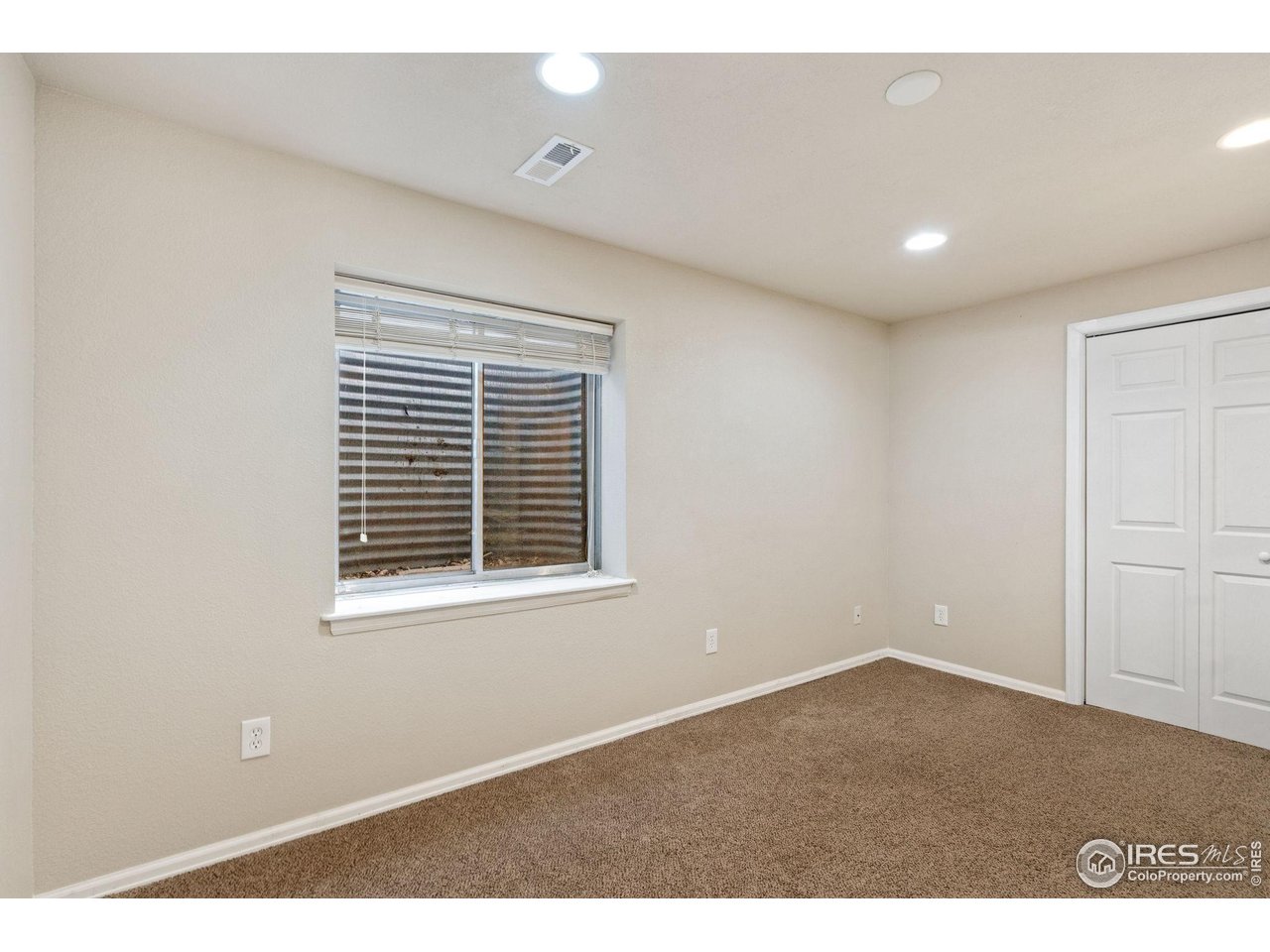6612 Avondale Road, Unit 2B Fort Collins, CO 80525 - Photo 18 of 20 Third bedroom on basement level