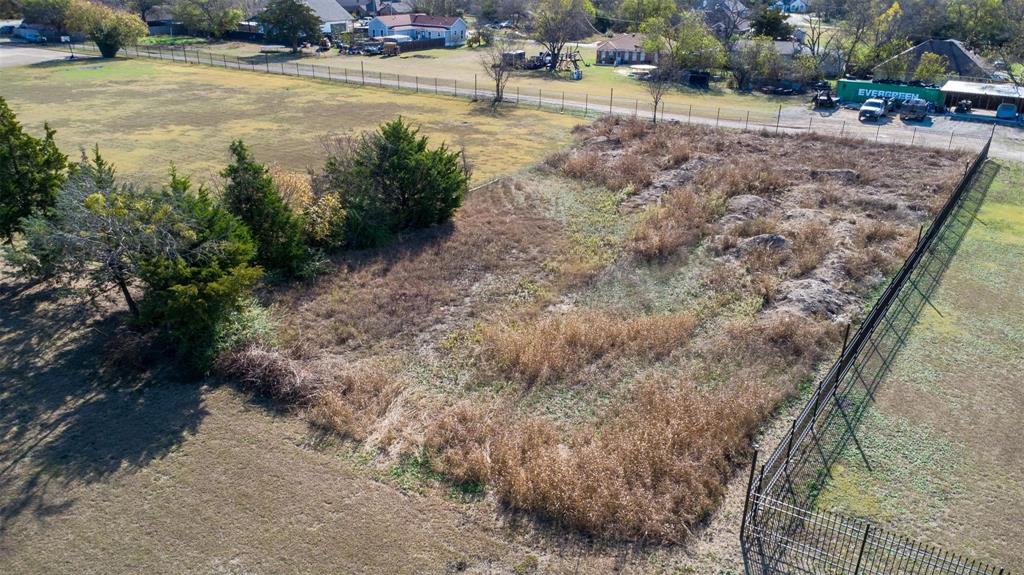 20 South Lancaster Hutchins Road Lancaster, TX 75146 - Photo 9 of 14 Expansive land parcel featuring existing perimeter fencing and mature trees