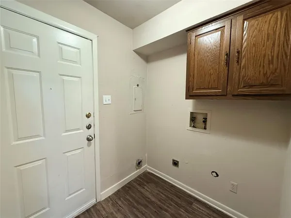 a view of room with washer and dryer