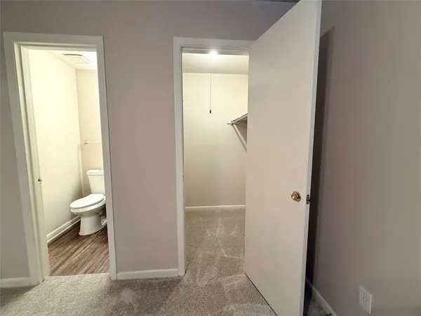 a bathroom with a toilet sink