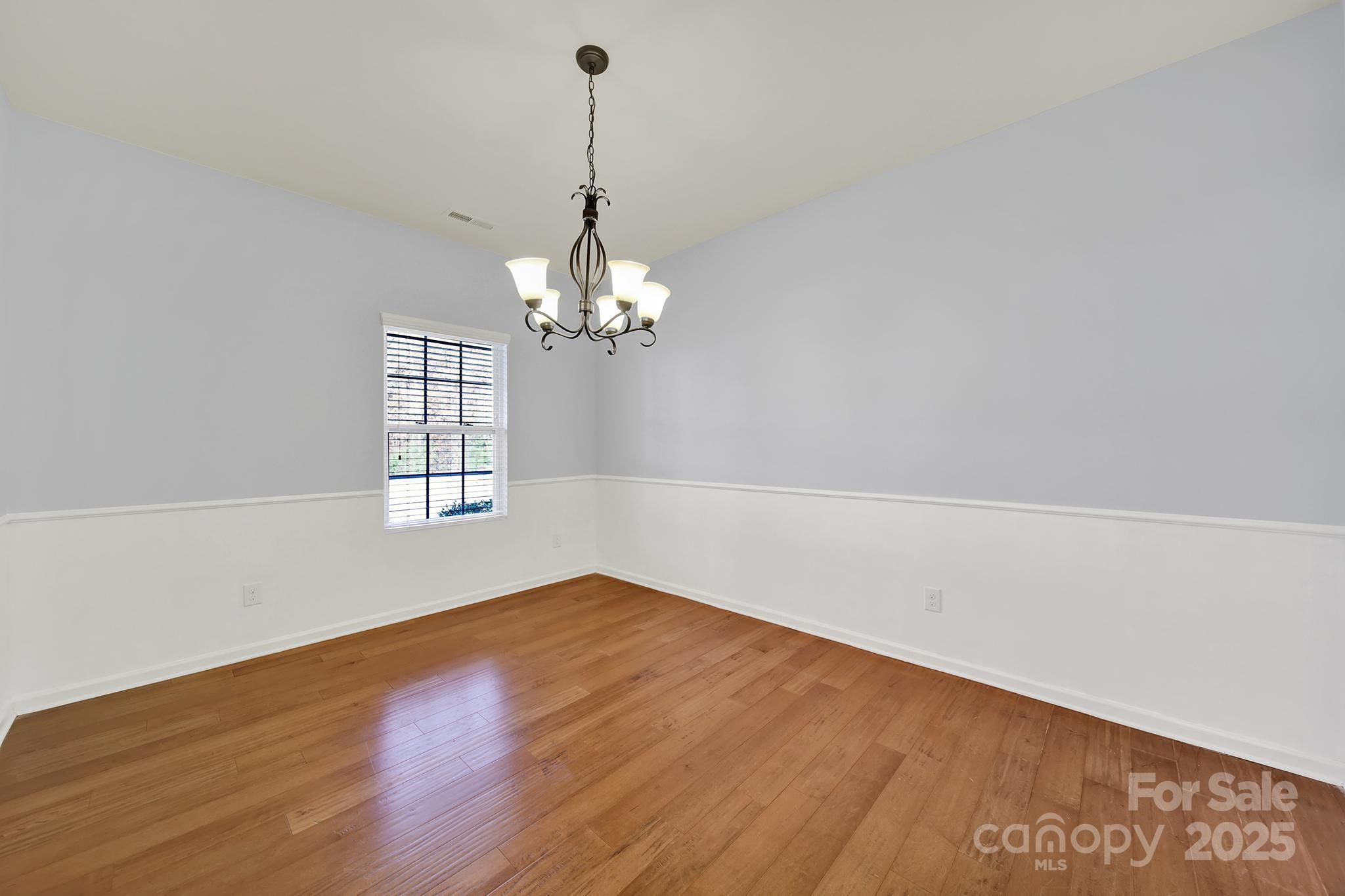 1726 Still River Way Fort Mill, SC 29708 - Photo 11 of 45 a view of empty room with wooden floor