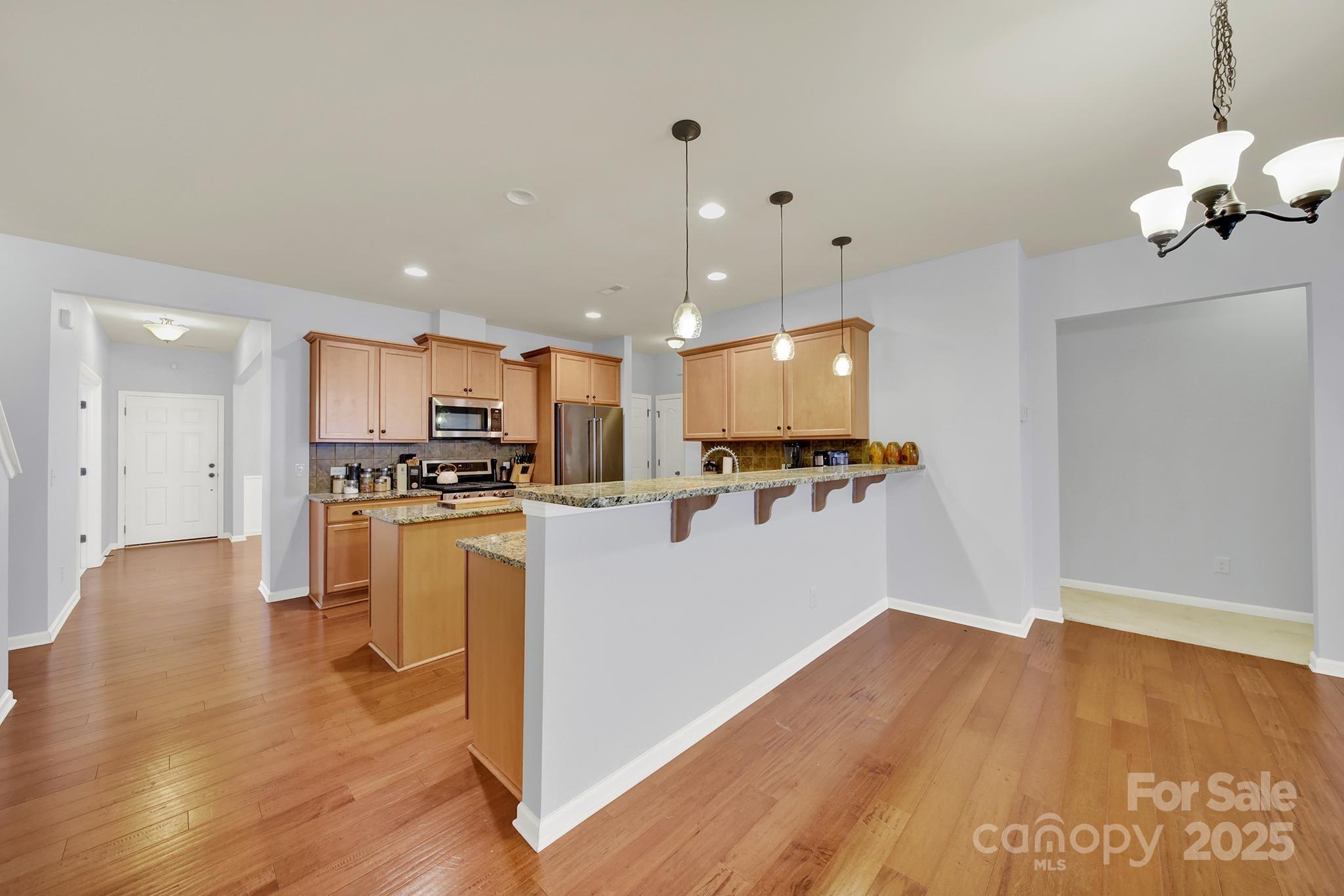 1726 Still River Way Fort Mill, SC 29708 - Photo 21 of 45 a view of kitchen with wooden floor