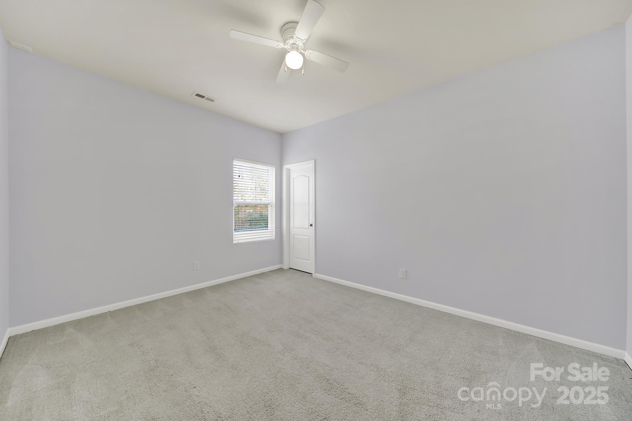 1726 Still River Way Fort Mill, SC 29708 - Photo 28 of 45 a view of an empty room with a window