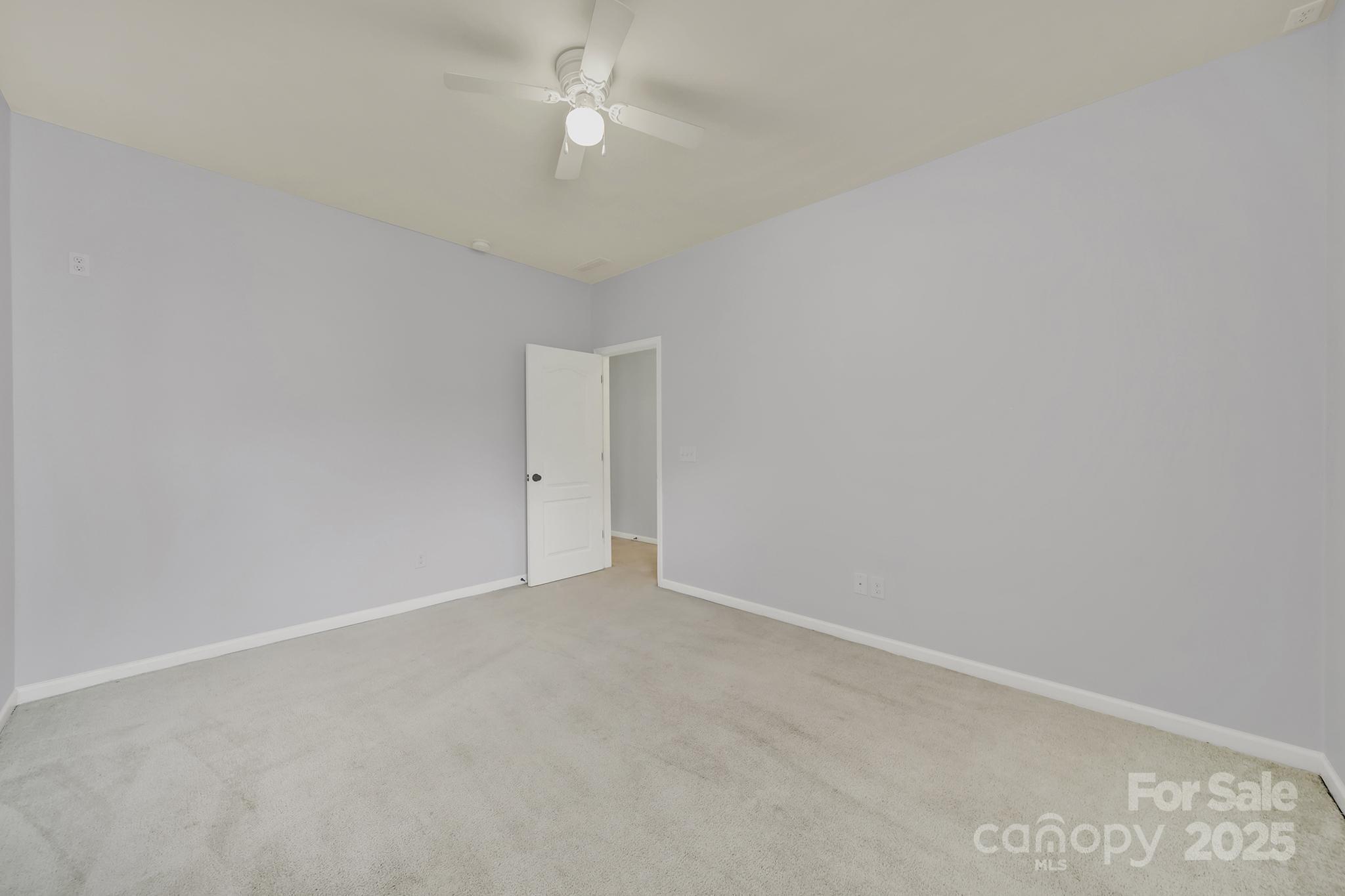1726 Still River Way Fort Mill, SC 29708 - Photo 29 of 45 a view of an empty room with a fan