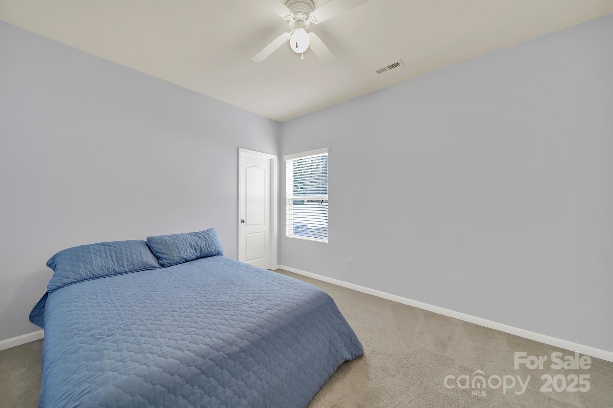 1726 Still River Way Fort Mill, SC 29708 - Photo 30 of 45 a bedroom with a bed and a window