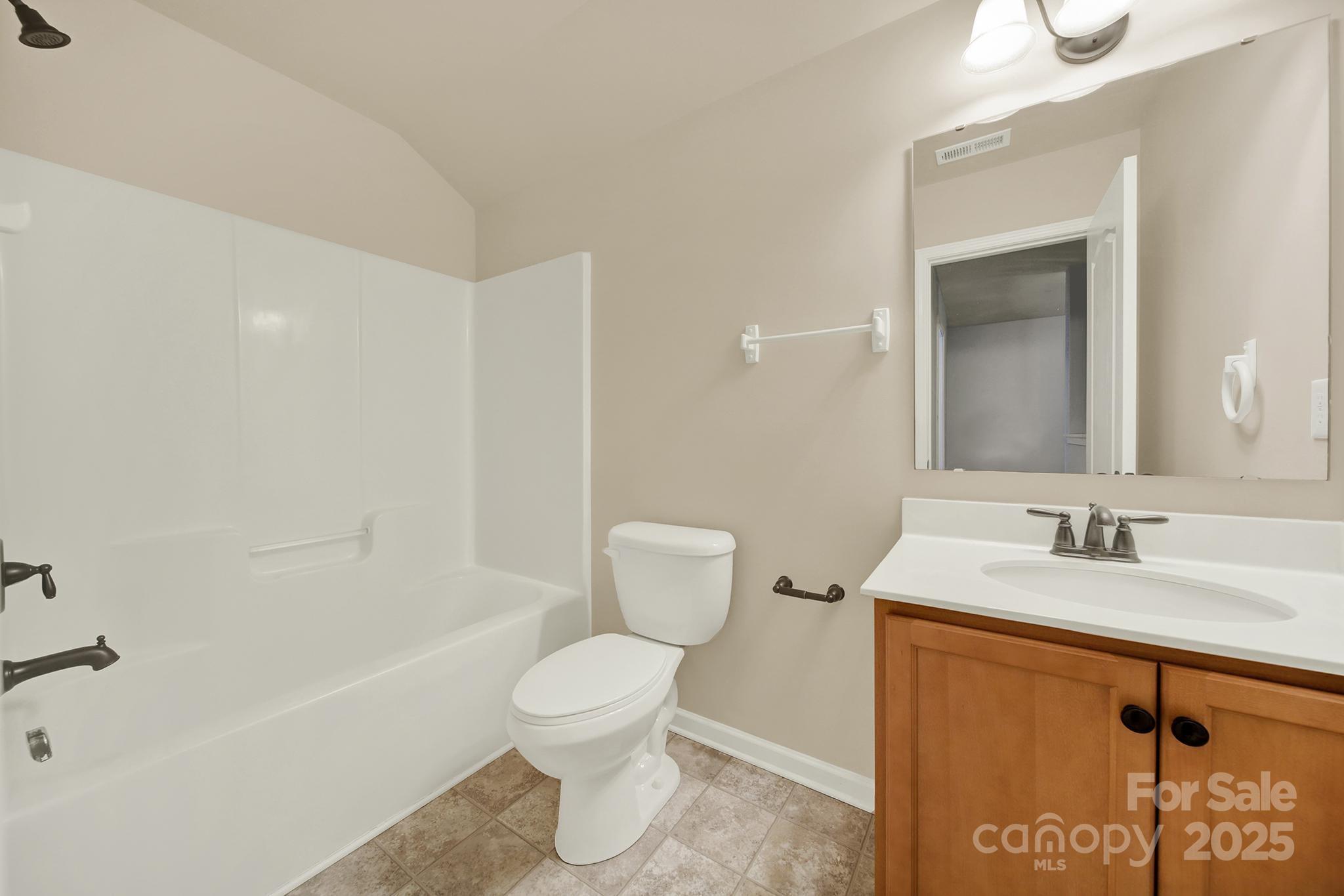 1726 Still River Way Fort Mill, SC 29708 - Photo 40 of 45 a bathroom with a sink a toilet and shower