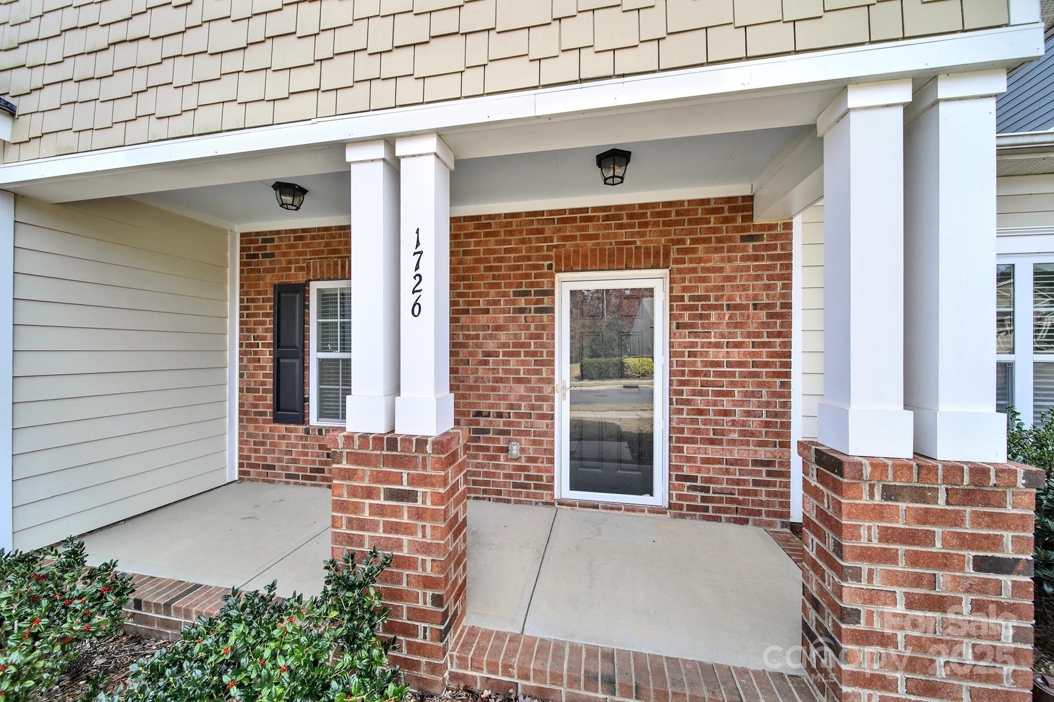 1726 Still River Way Fort Mill, SC 29708 - Photo 44 of 45 a front view of a house with a yard