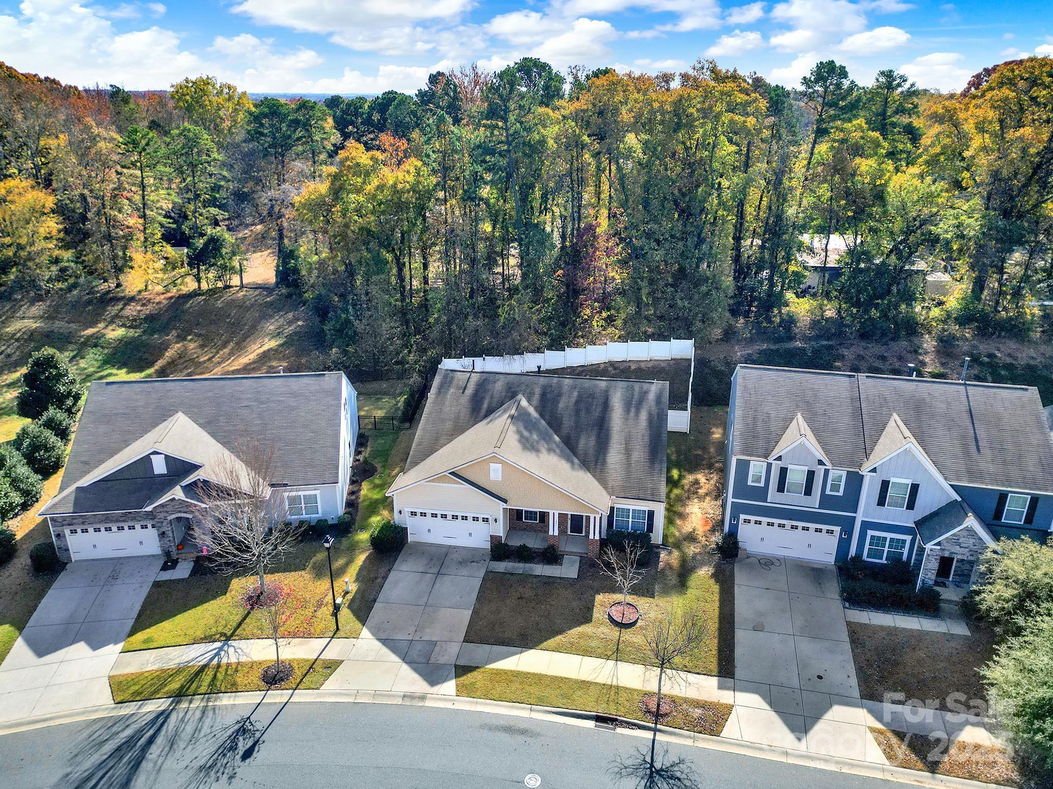1726 Still River Way Fort Mill, SC 29708 - Photo 5 of 45 an aerial view of a house with swimming pool and sitting space