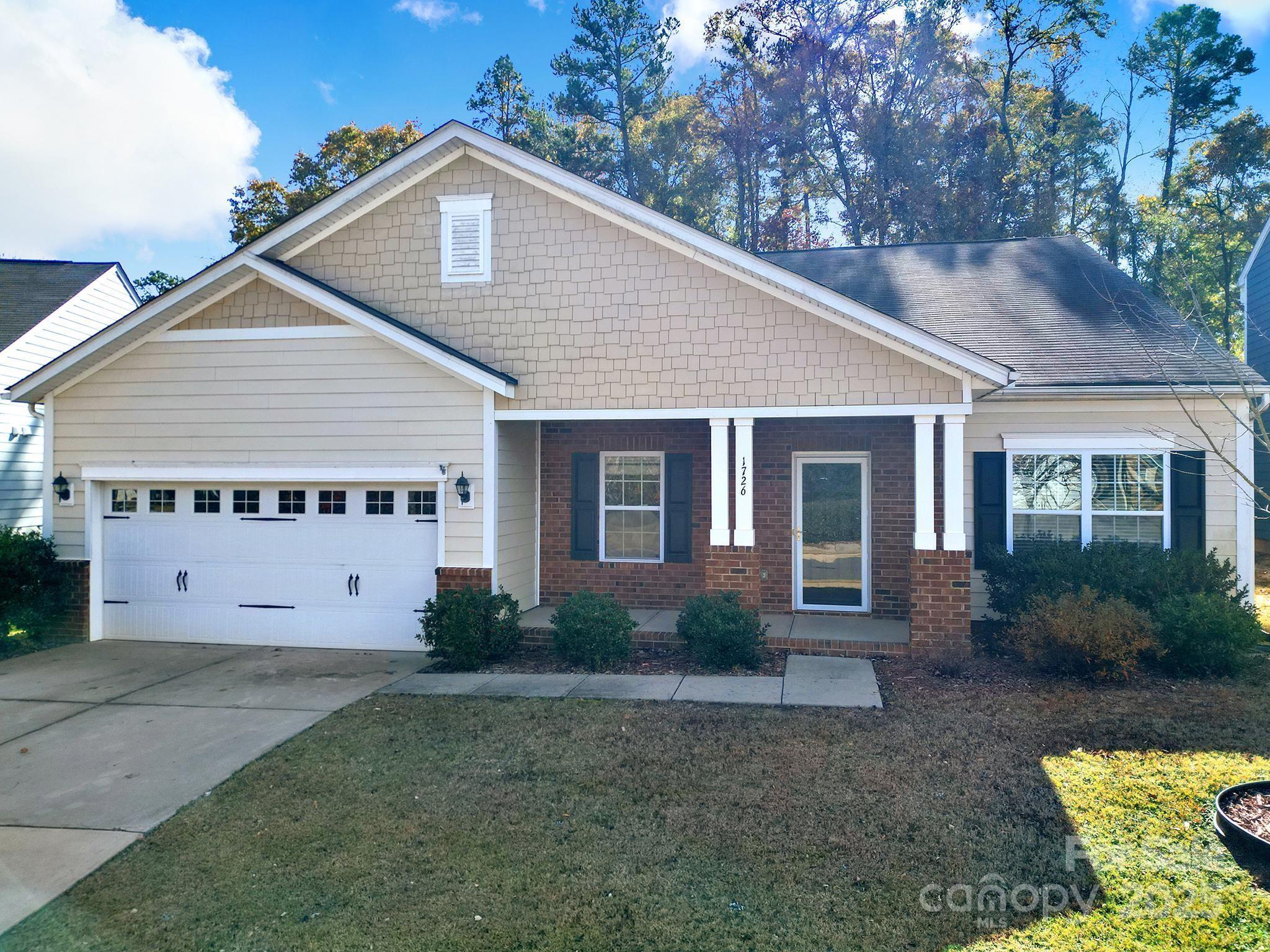 1726 Still River Way Fort Mill, SC 29708 - Photo 9 of 45 a view of a house with a yard plants and large tree