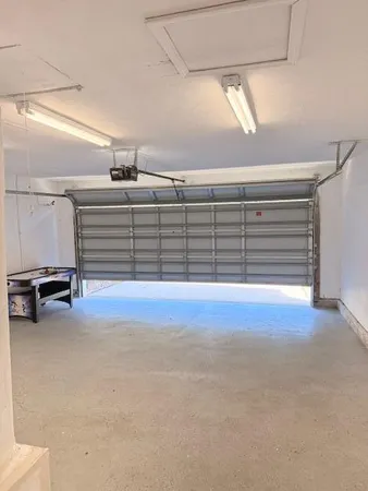 a view of an empty room with a balcony
