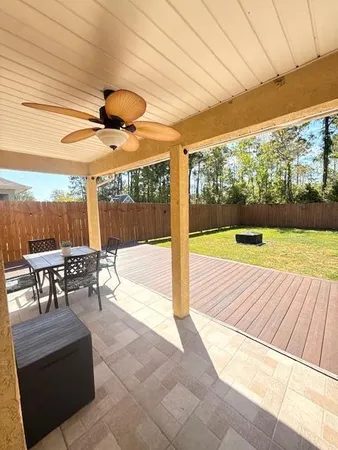 a view of swimming pool with patio