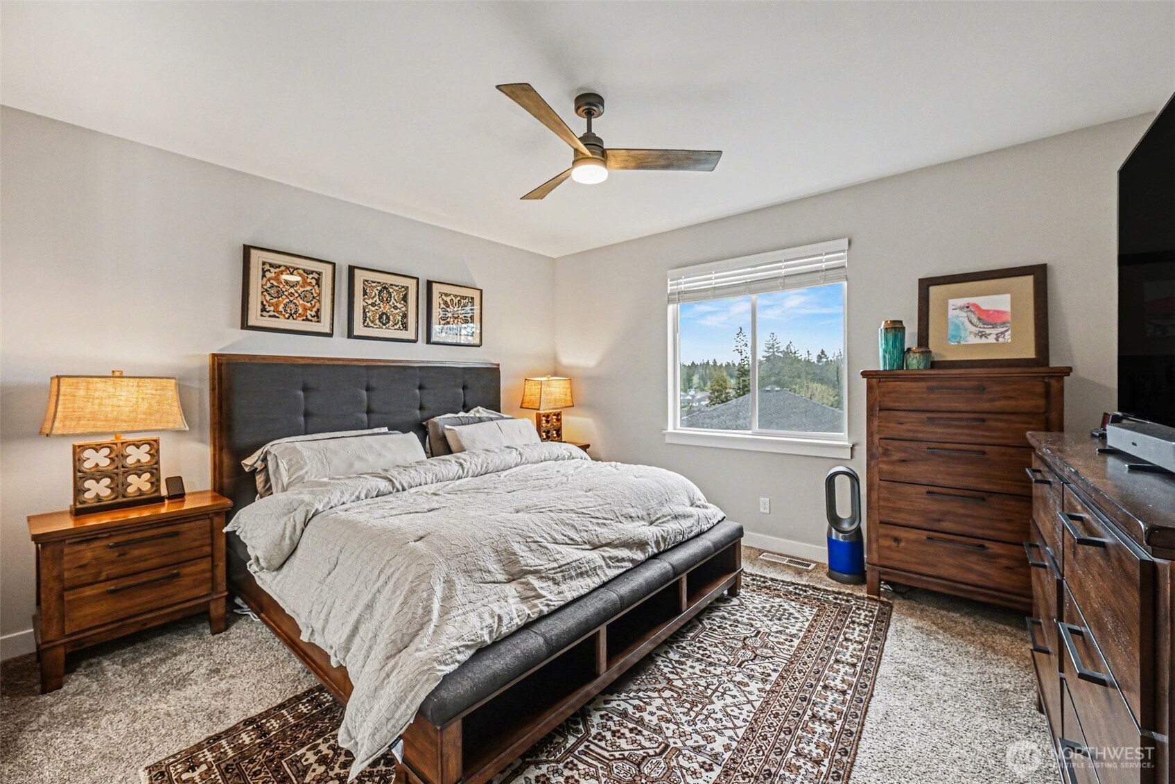 9779 Prospect Place Gig Harbor, WA 98332 - Photo 14 of 33 a bedroom with a bed and a window