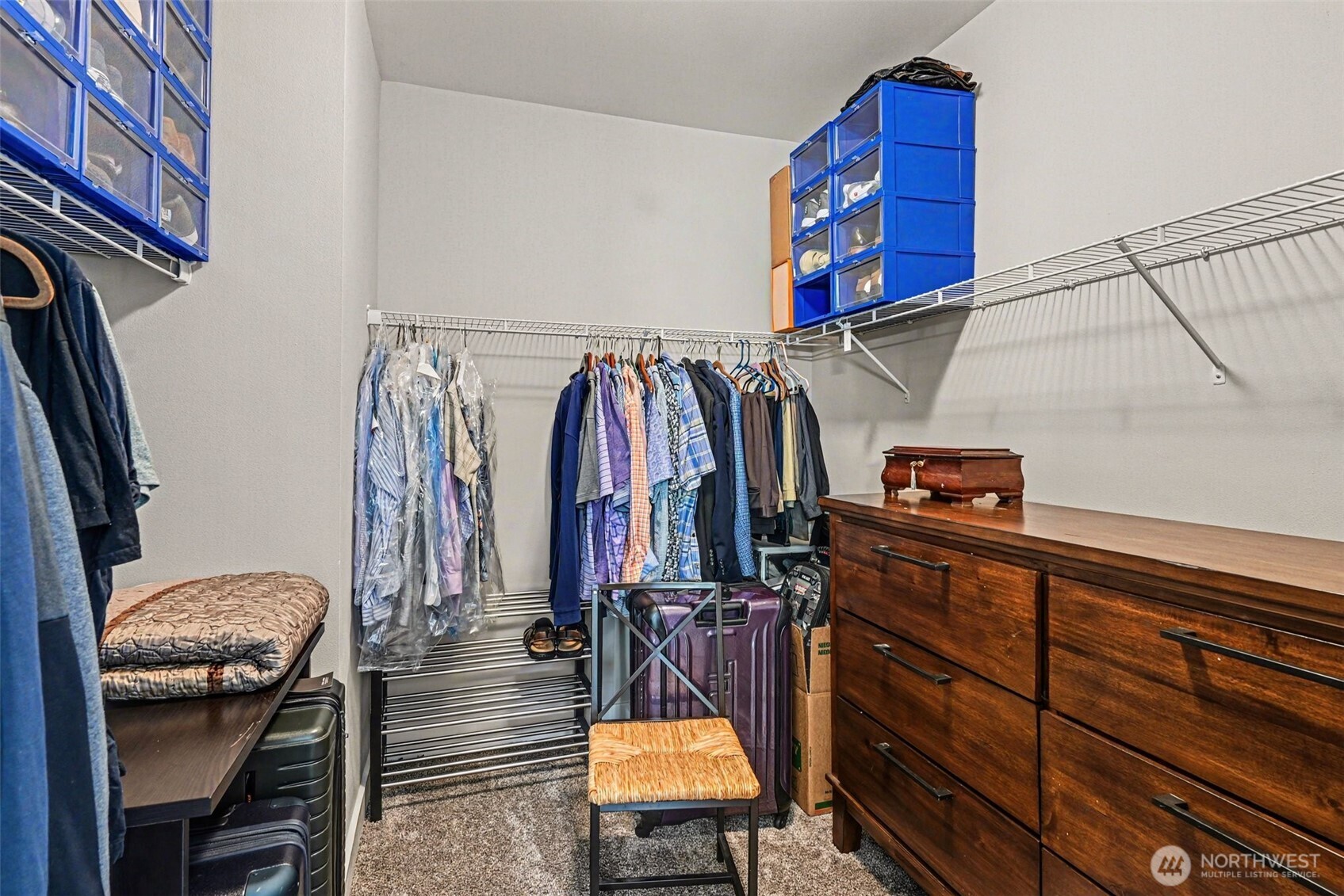 9779 Prospect Place Gig Harbor, WA 98332 - Photo 18 of 33 a view of walk in closet with clothes and shoes
