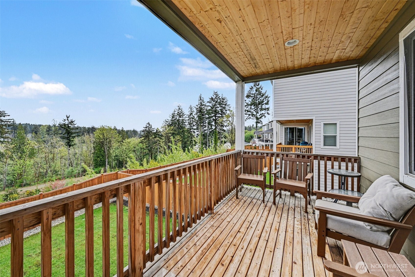 9779 Prospect Place Gig Harbor, WA 98332 - Photo 27 of 33 a view of a two chairs in the balcony