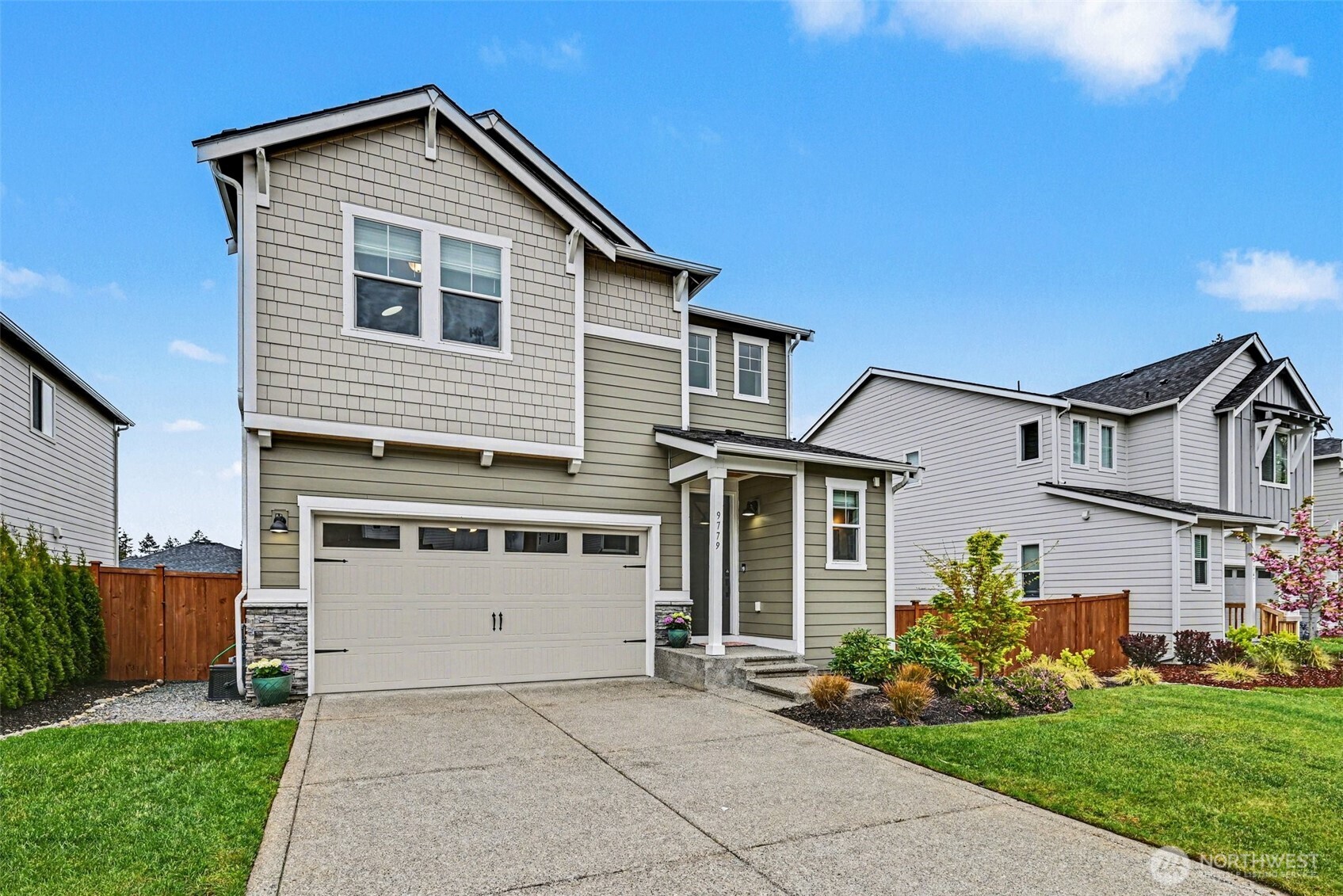 9779 Prospect Place Gig Harbor, WA 98332 - Photo 3 of 33 a view of house with yard
