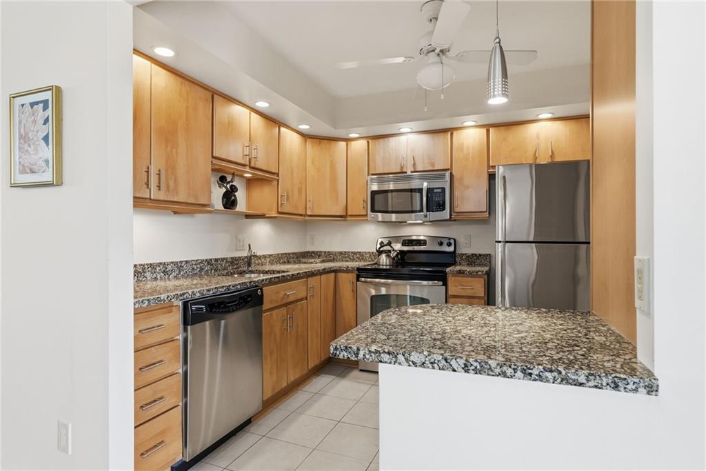 5600 Munhall Road, Unit 504 Pittsburgh, PA 15217 - Photo 21 of 41 The updated gourmet kitchen features dazzling granite countertops, stainless steel appliances, and solid wood cabinetry.